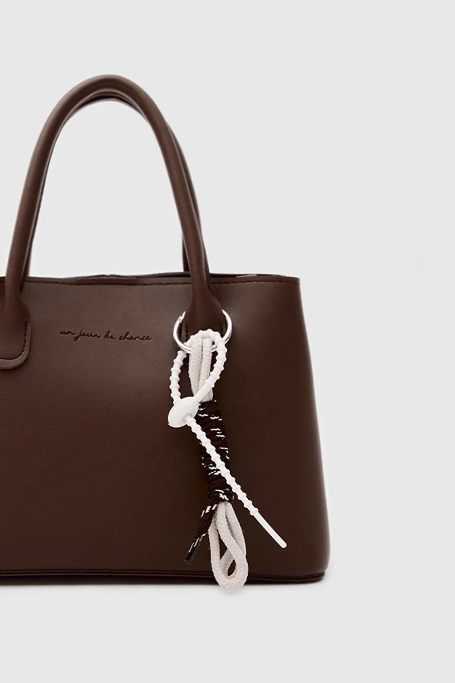 faux leather crossbody bag in dark brown