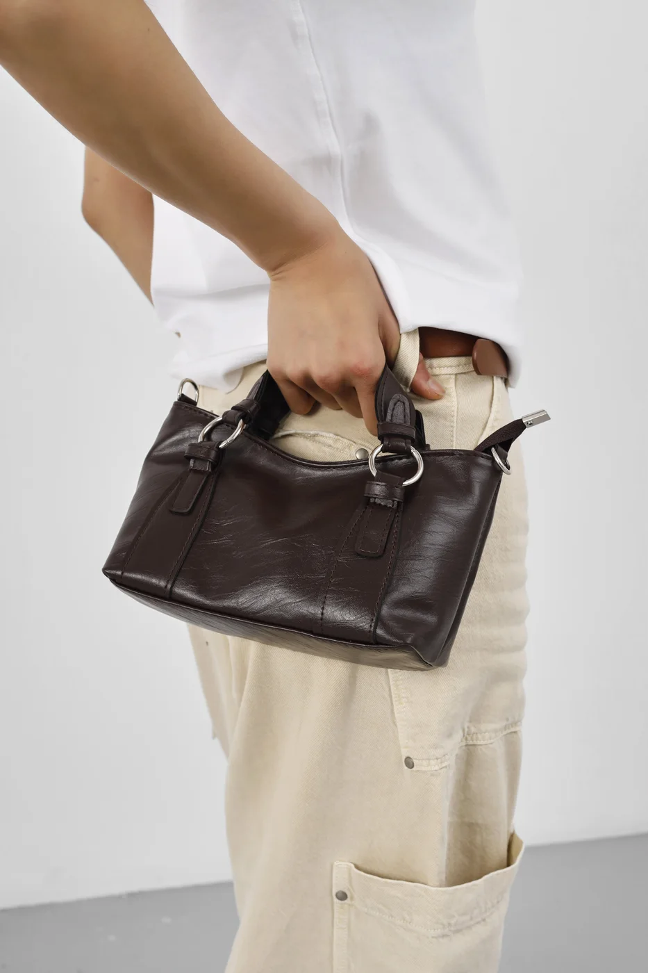 Faux leather crossbody bag Faux leather crossbody bag in dark brown