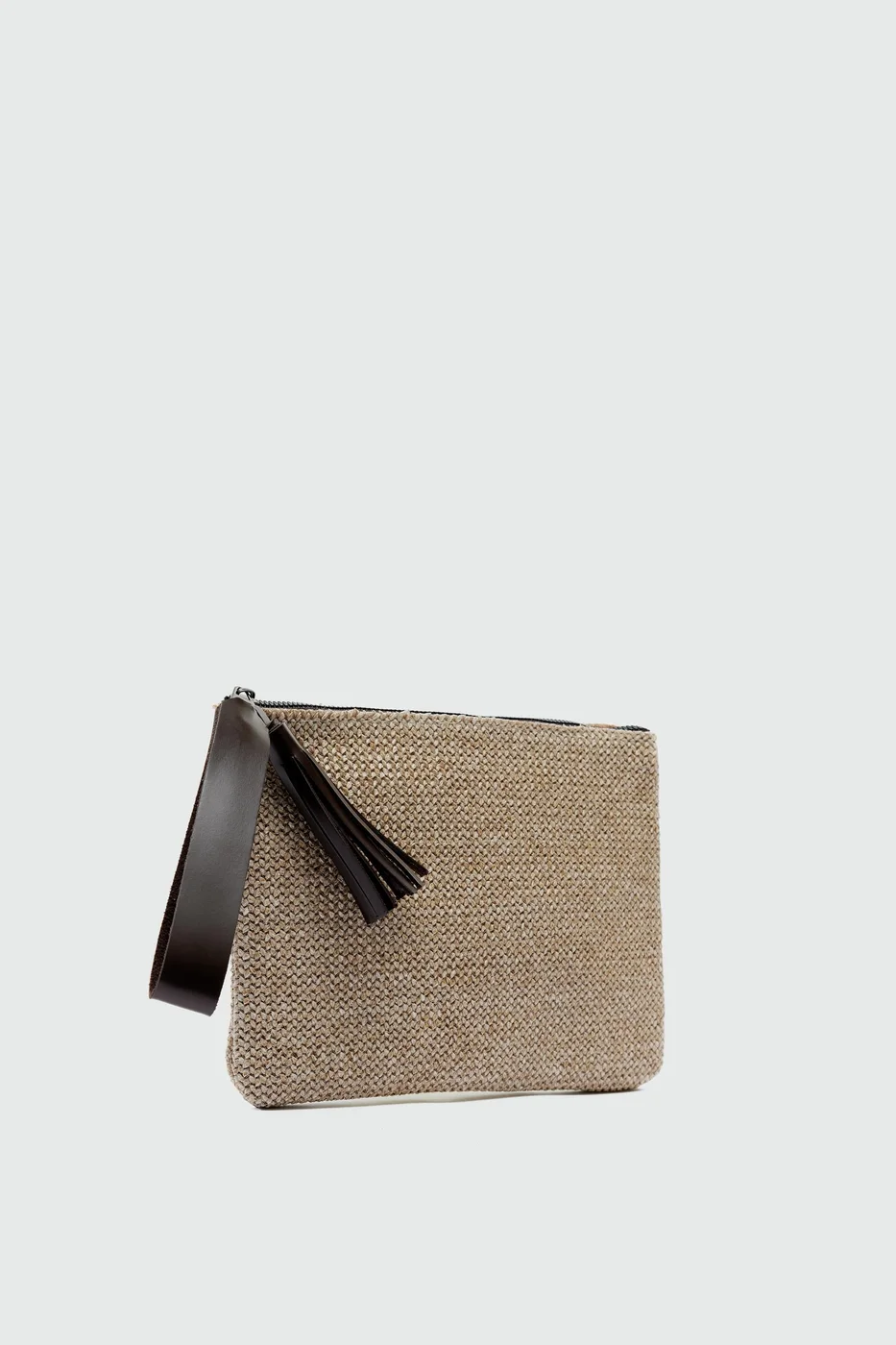 Woven clutch bag with fringe detail in brown
