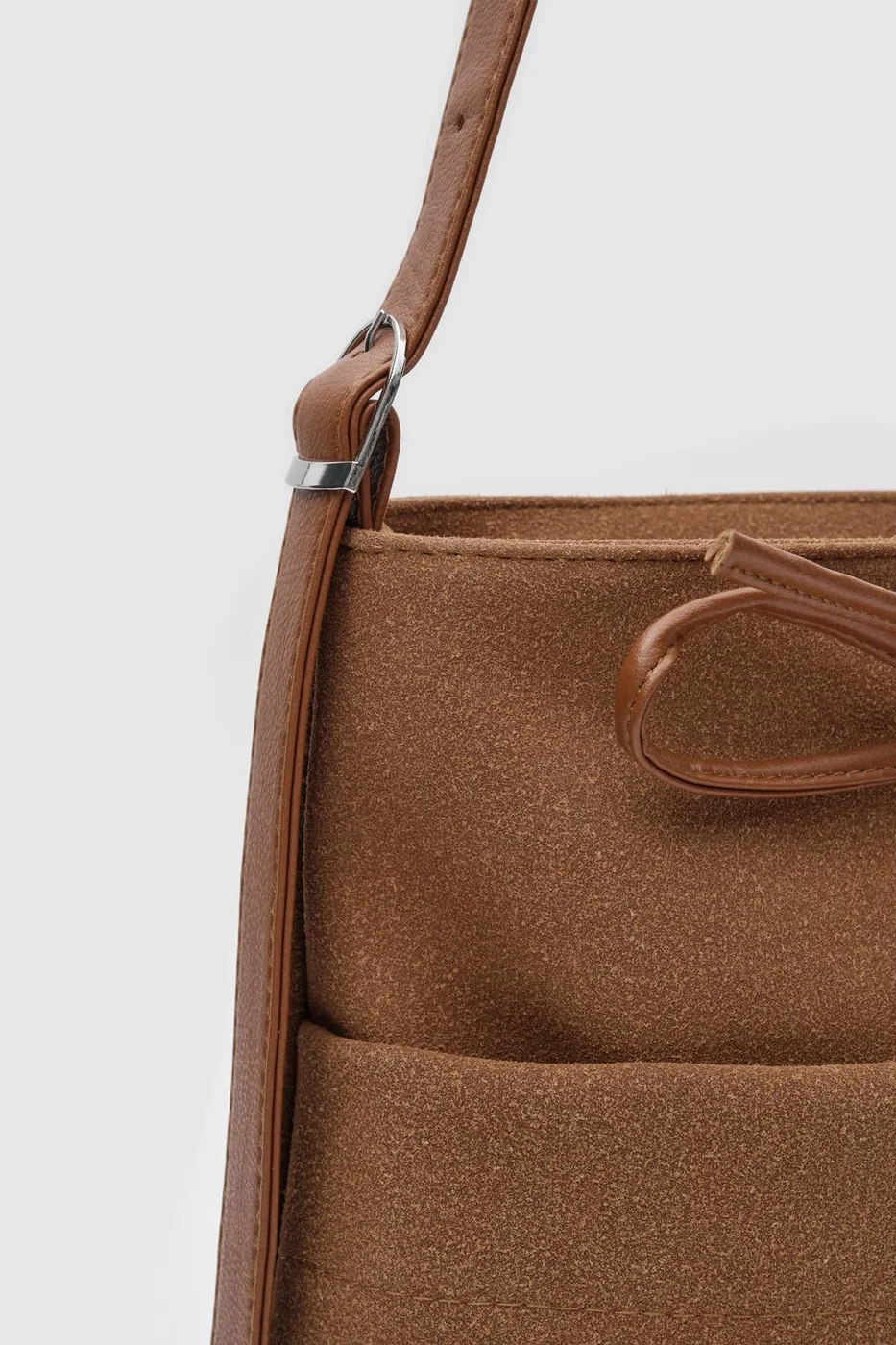 faux suede shoulder bag in tan