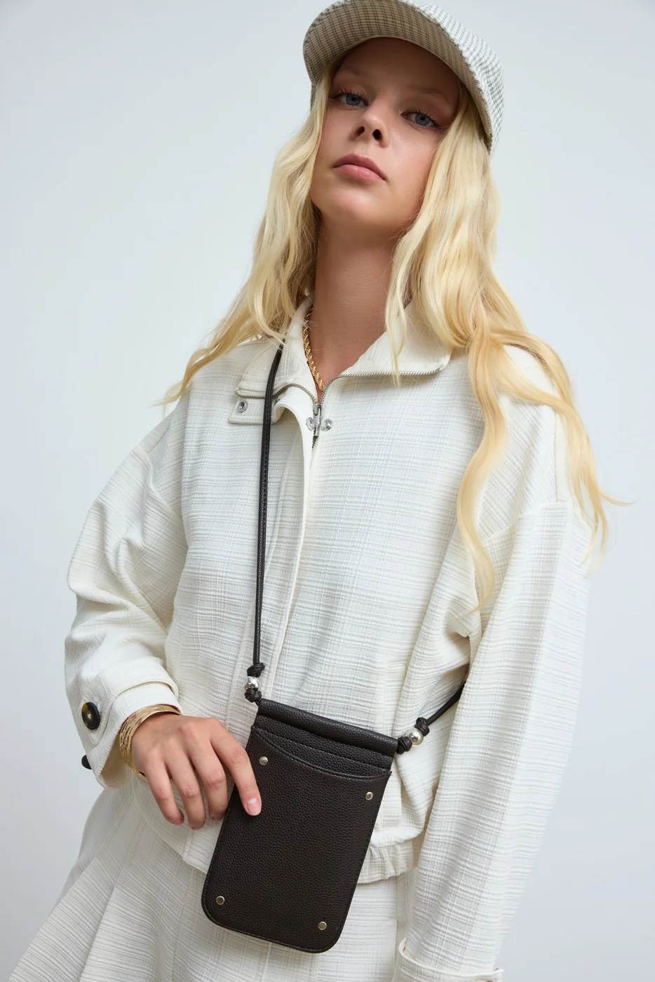 Faux leather phone bag in dark brown
