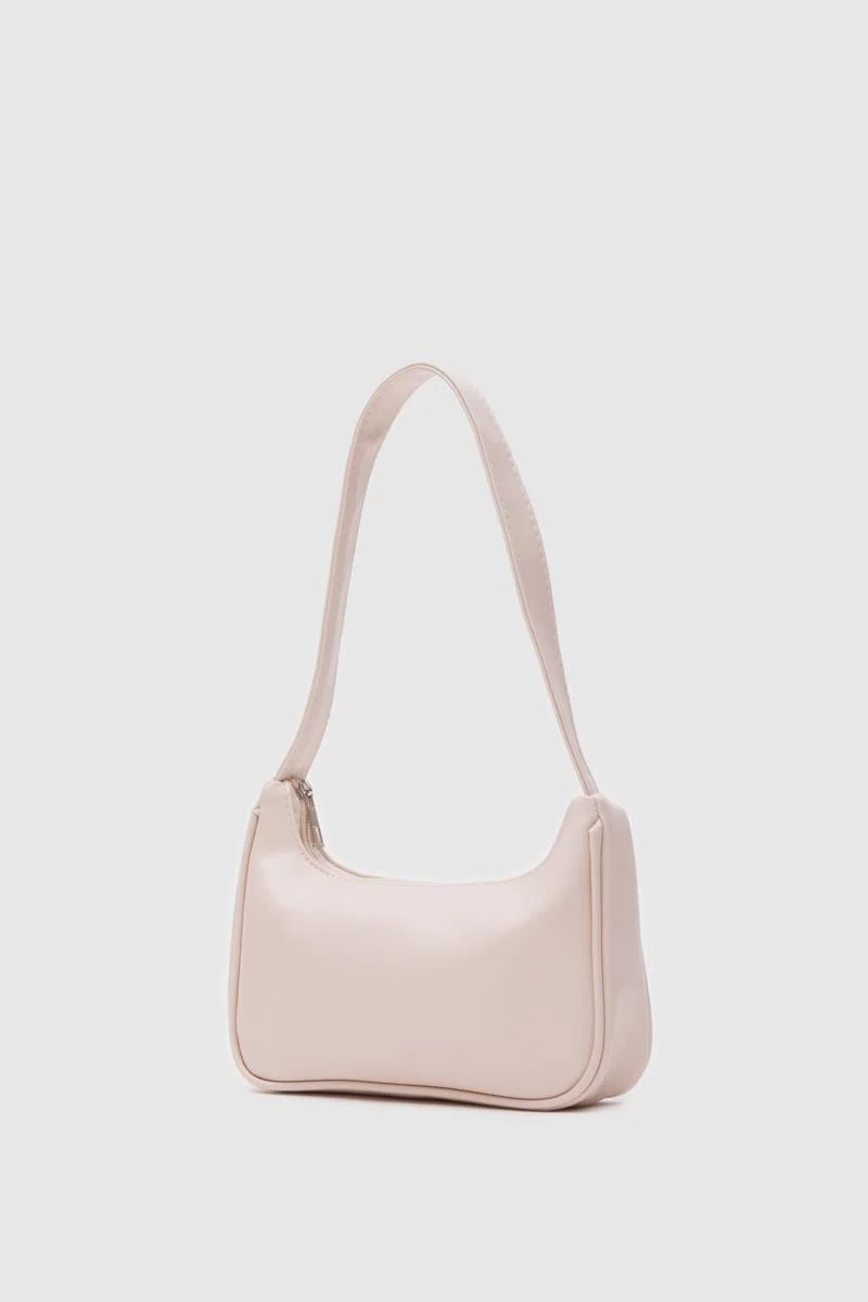 Faux leather baguette bag in cream