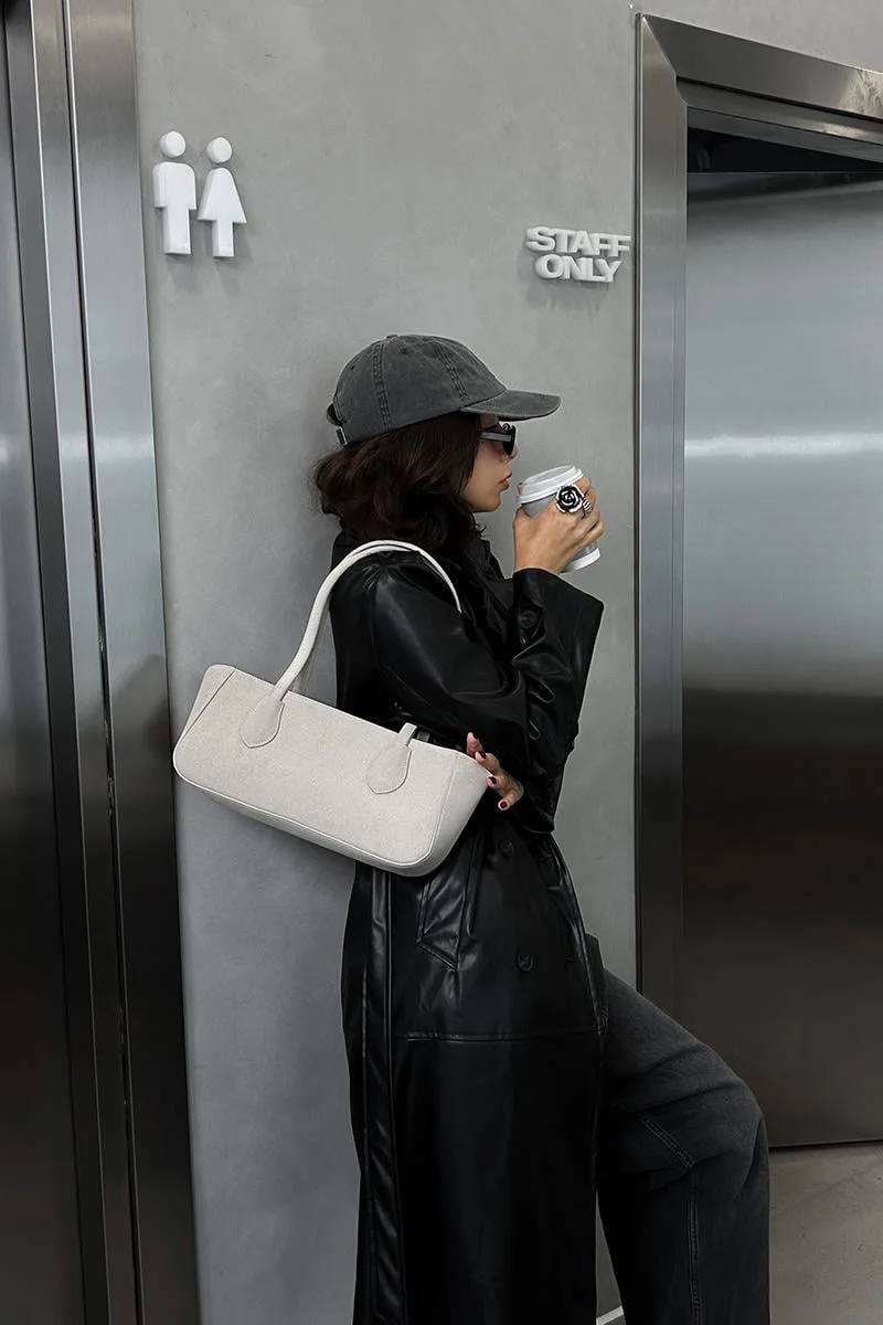faux suede baguette bag in cream