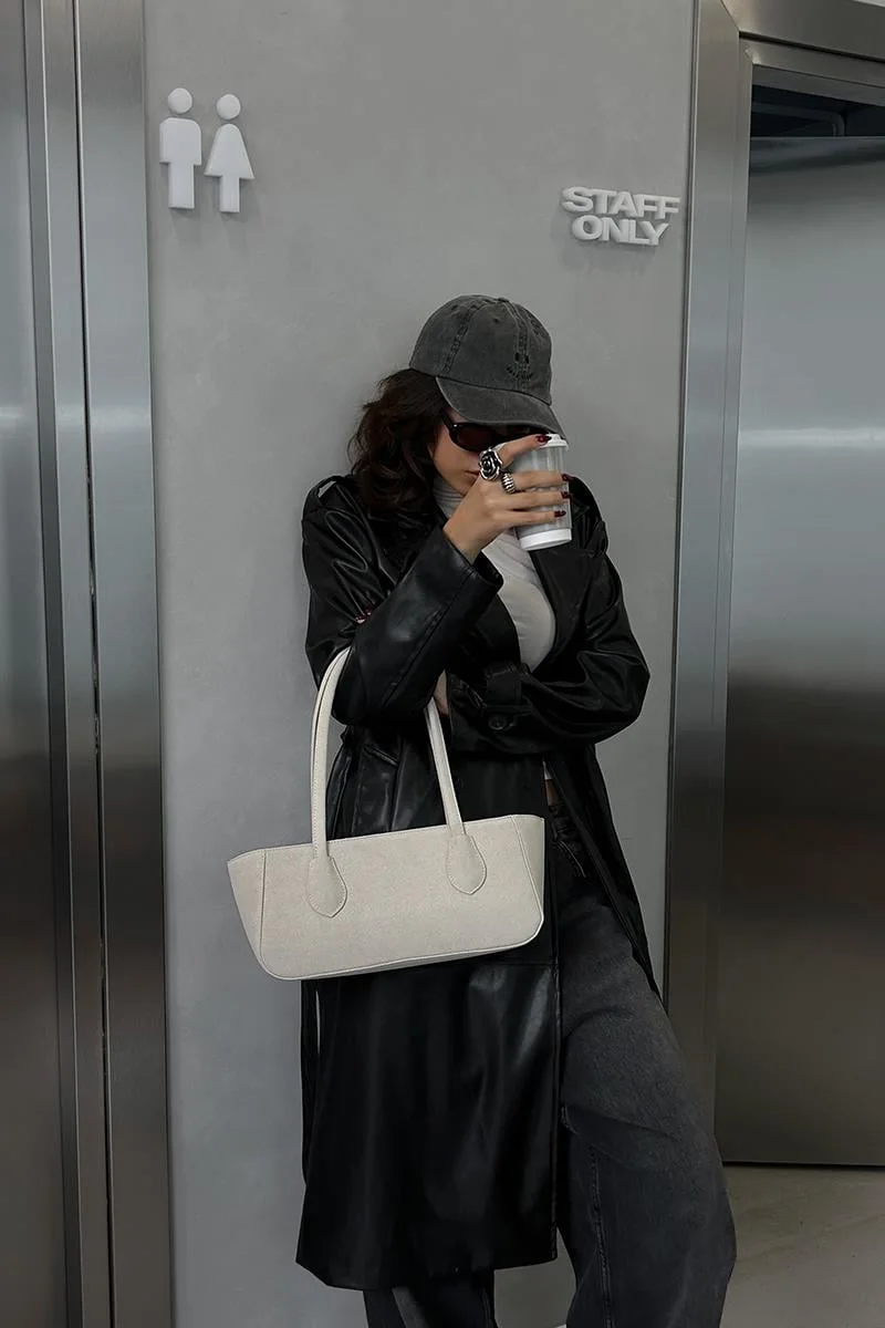 faux suede baguette bag in cream
