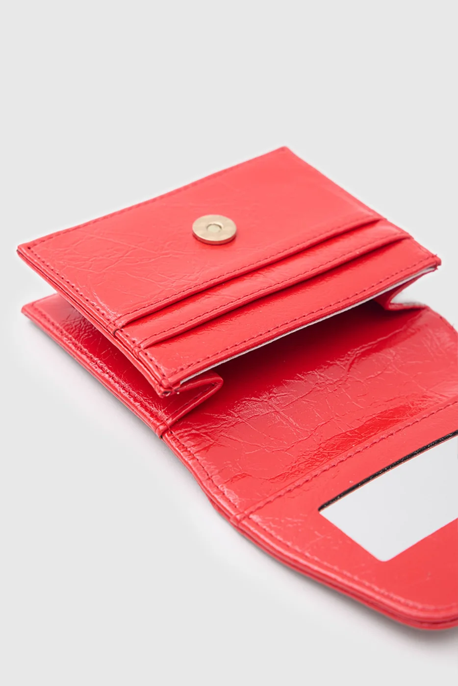 Leya faux leather wallet with mirror and lipstick pocket in red