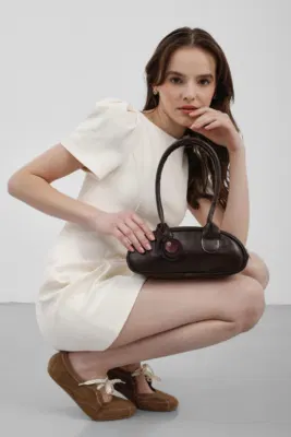Faux leather baguette bag for stylish outings Faux leather baguette bag for stylish outings in dark brown