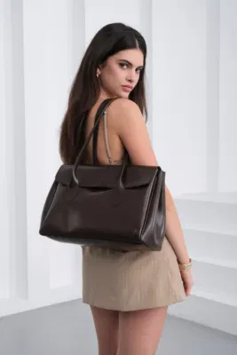 Faux leather shoulder bag in dark brown