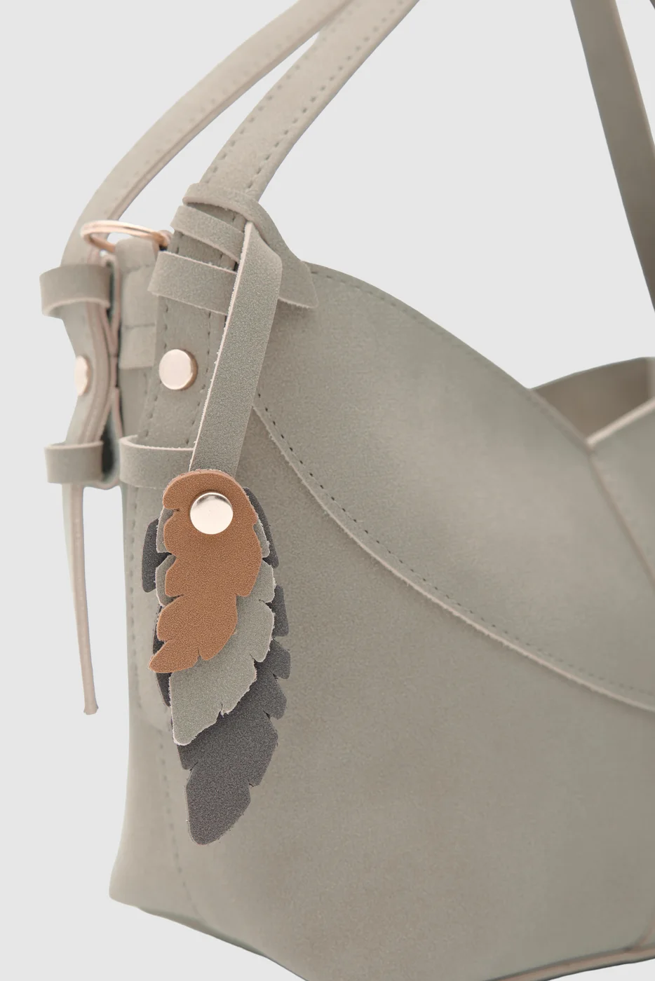 faux suede crossbody bag in taupe