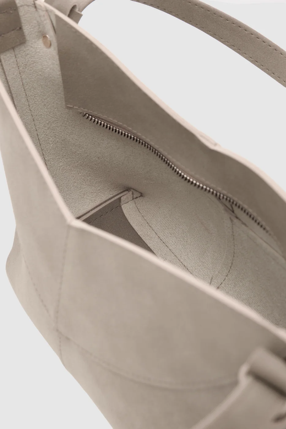 faux suede crossbody bag in taupe