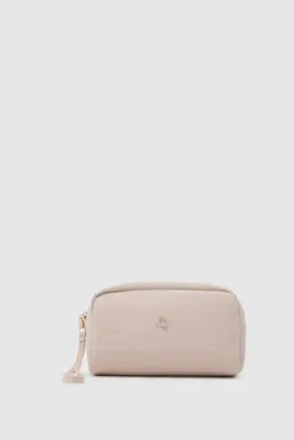 Faux leather cosmetic bag design in beige