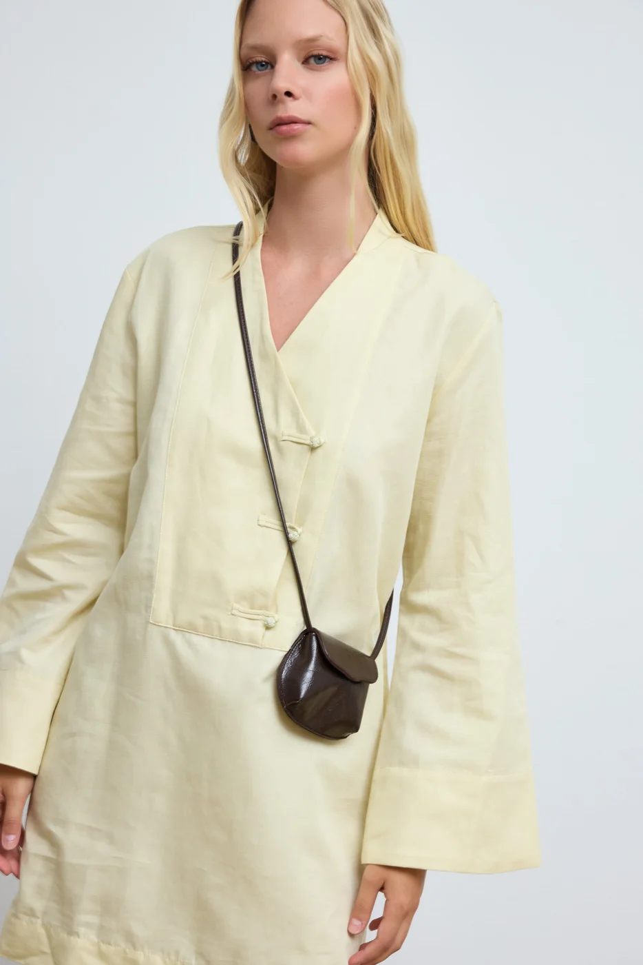 Mini crossbody bag in faux leather in dark brown