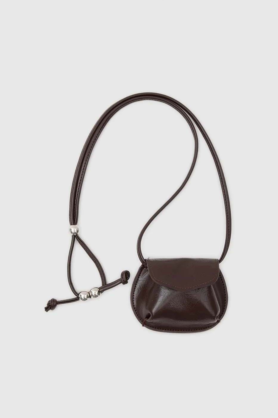 Mini crossbody bag in faux leather in dark brown