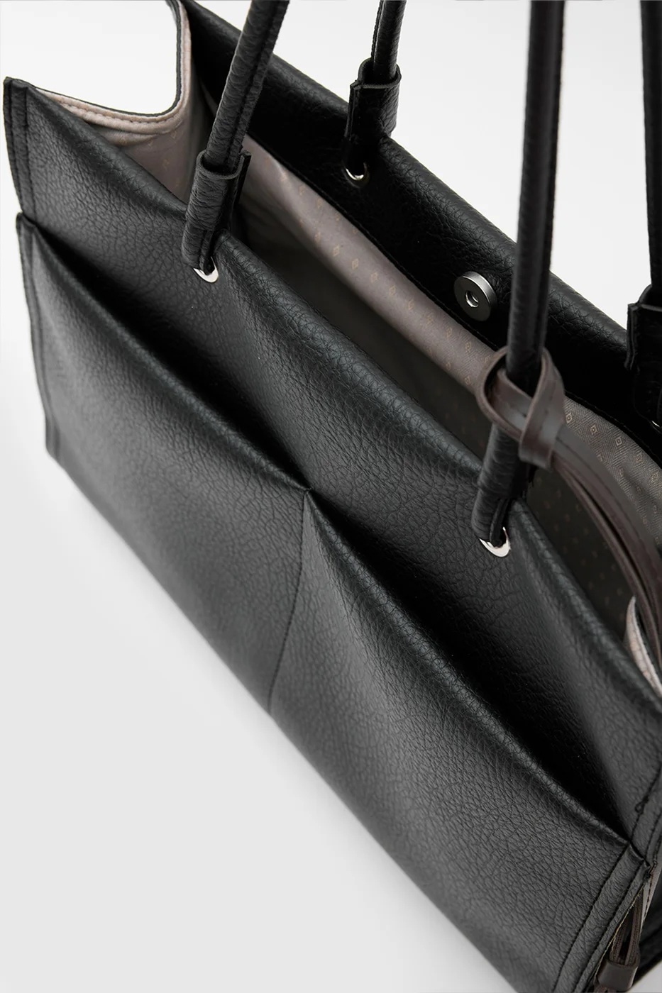 Faux leather shoulder bag with stylish design Faux leather shoulder bag with stylish design in black