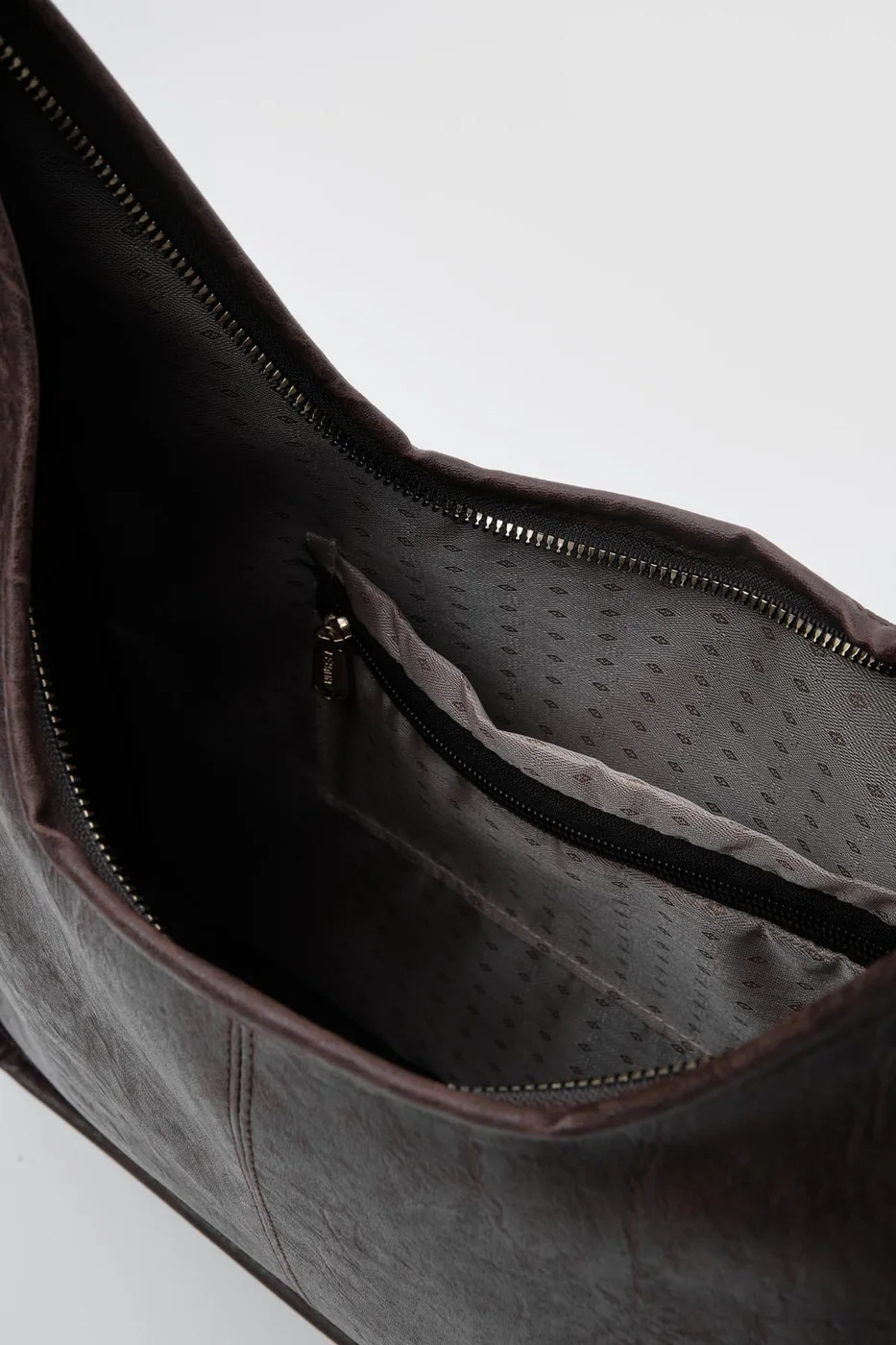 Faux leather shoulder bag in dark brown