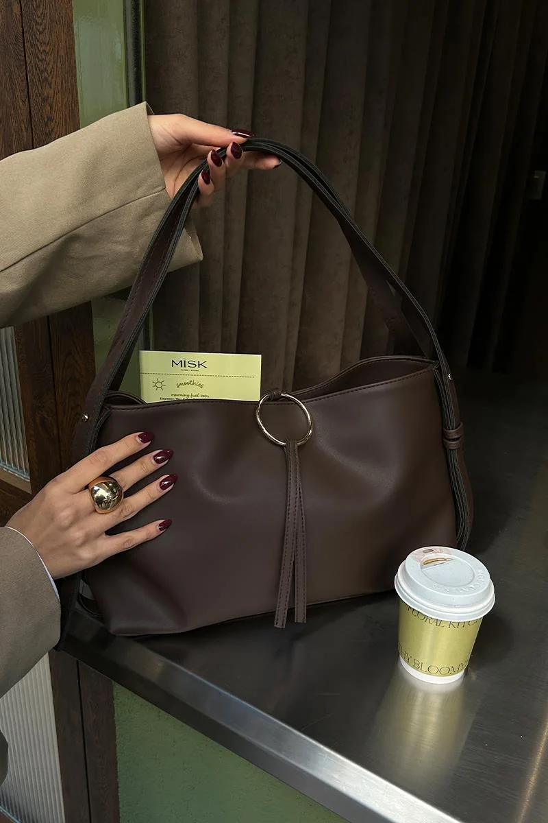 Faux leather shoulder bag for stylish women Faux leather shoulder bag for stylish women in dark brown