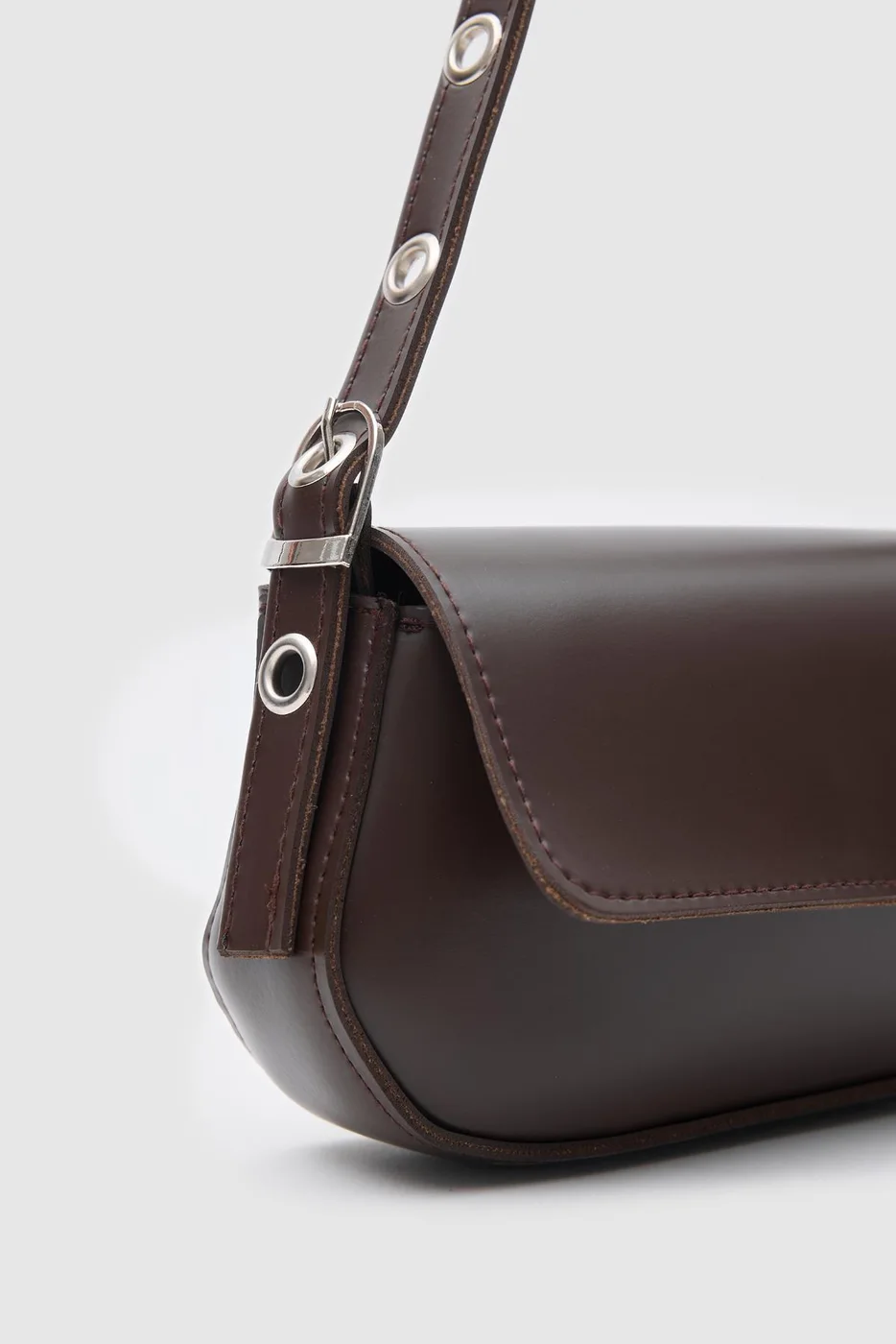 Faux leather baguette bag in dark brown