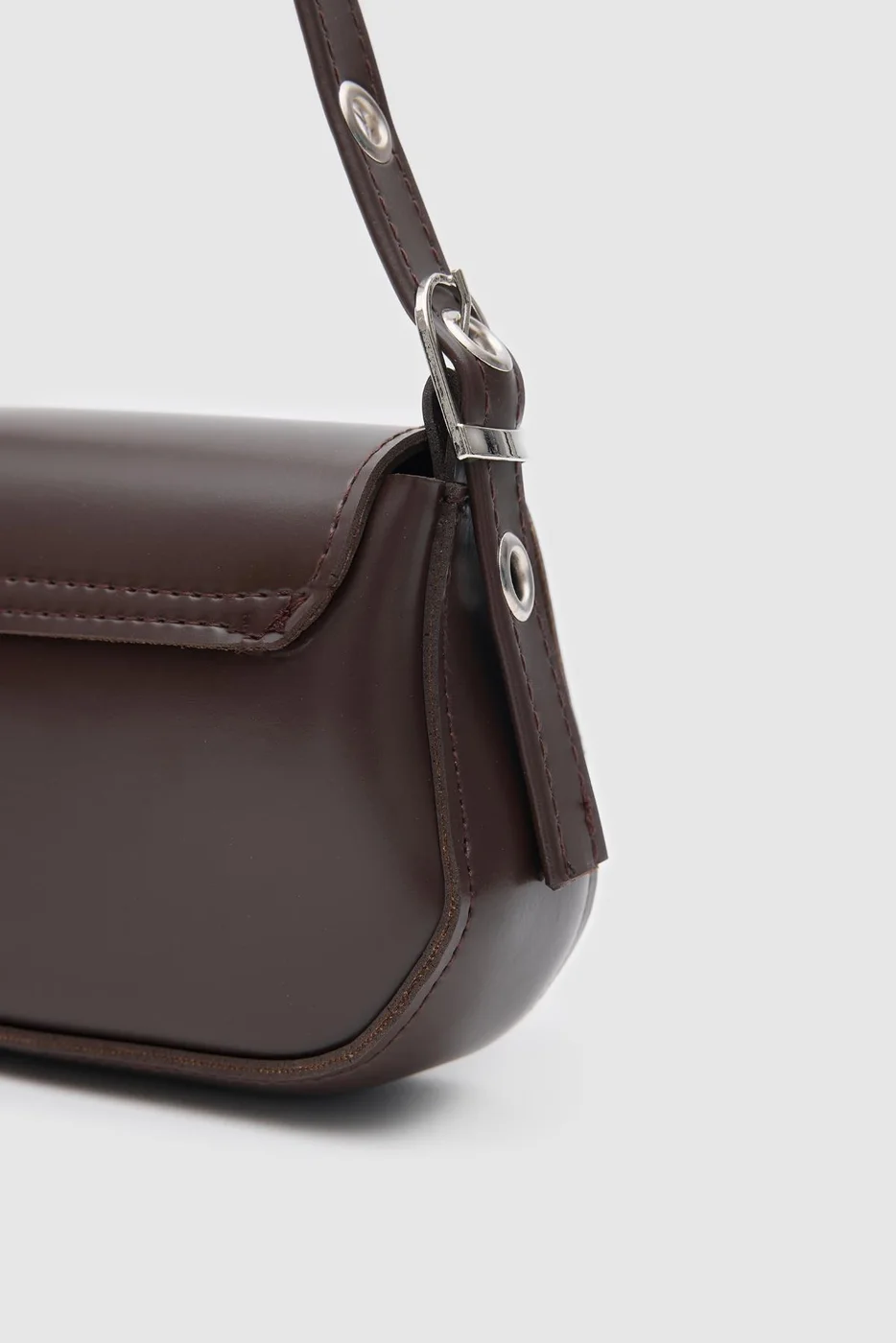 Faux leather baguette bag in dark brown
