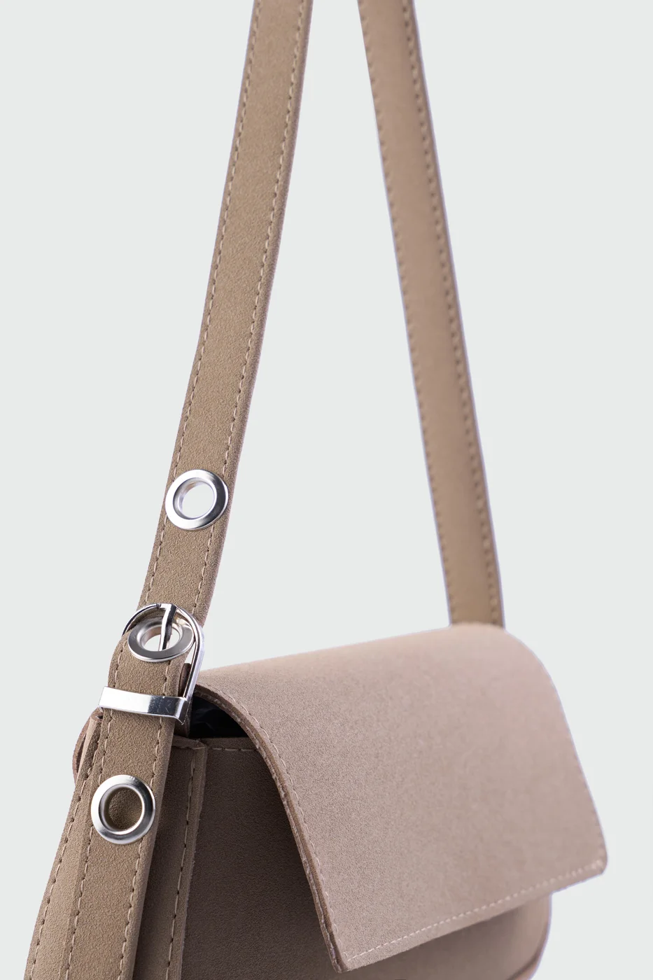 faux suede shoulder bag in taupe