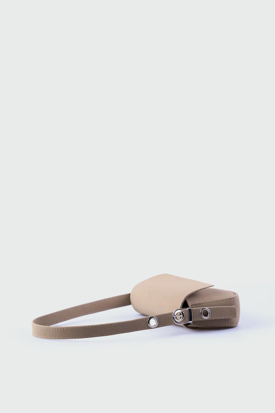 faux suede shoulder bag in taupe