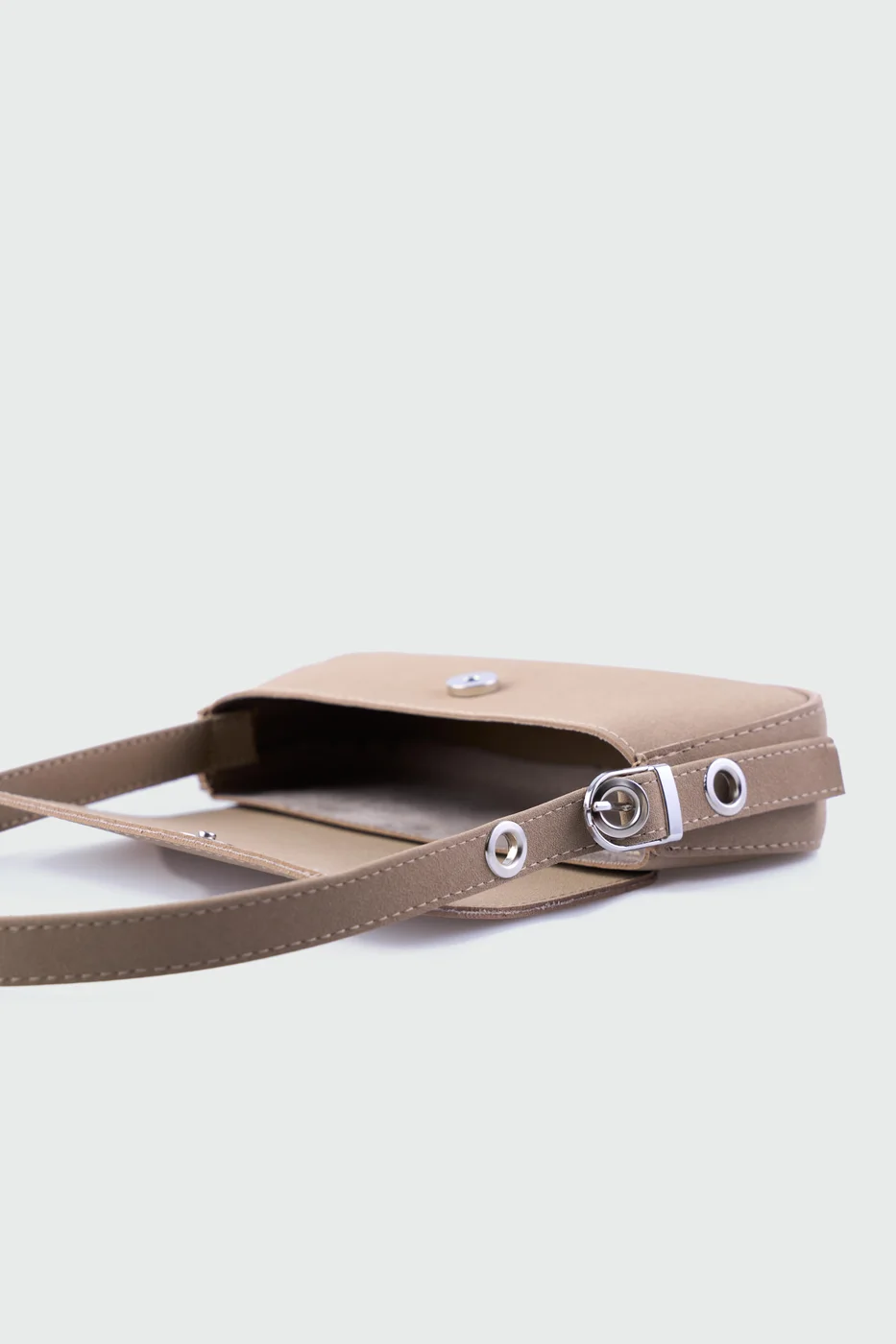 faux suede shoulder bag in taupe