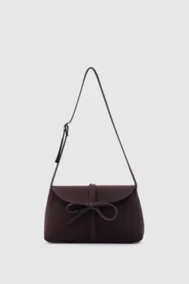 faux suede shoulder bag with bow in dark brown