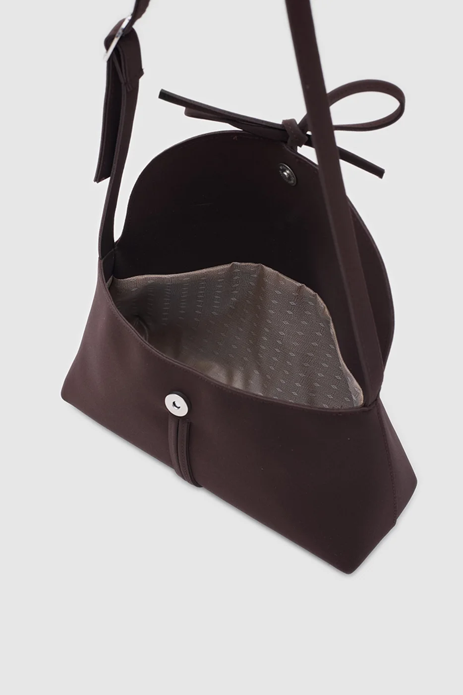 faux suede shoulder bag with bow in dark brown