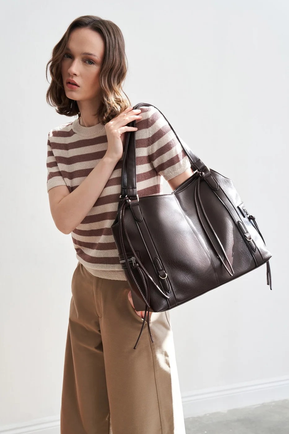 Faux leather shoulder bag for daily use Faux leather shoulder bag for daily use in dark brown