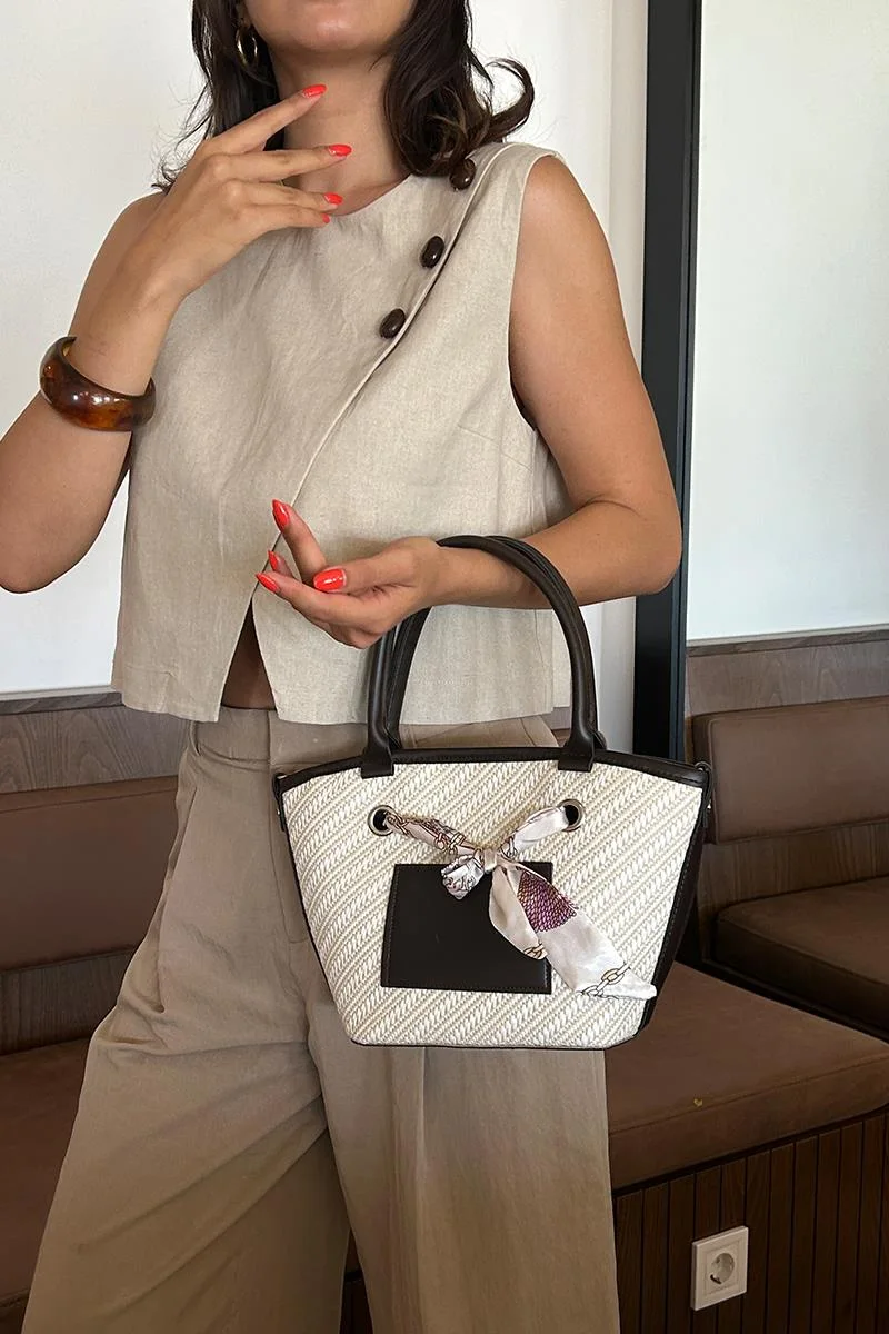 Faux leather shoulder bag in brown