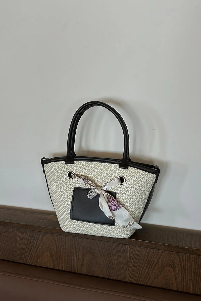 Faux leather shoulder bag in brown