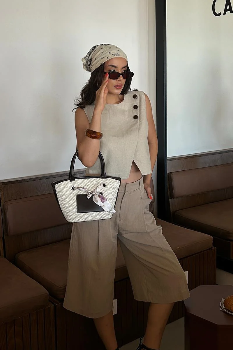 Faux leather shoulder bag in brown