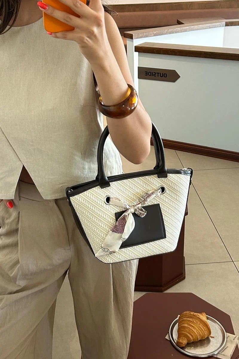 Faux leather shoulder bag in brown