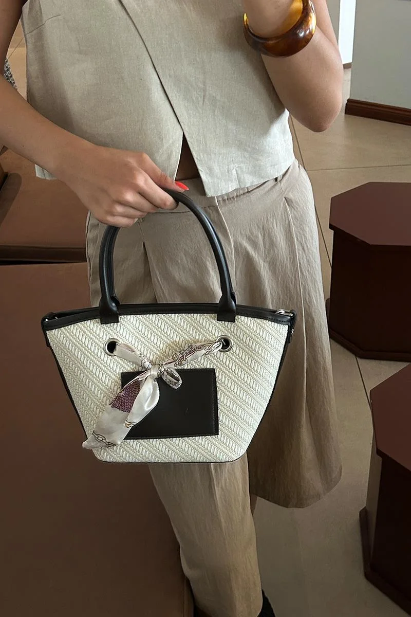 Faux leather shoulder bag in brown