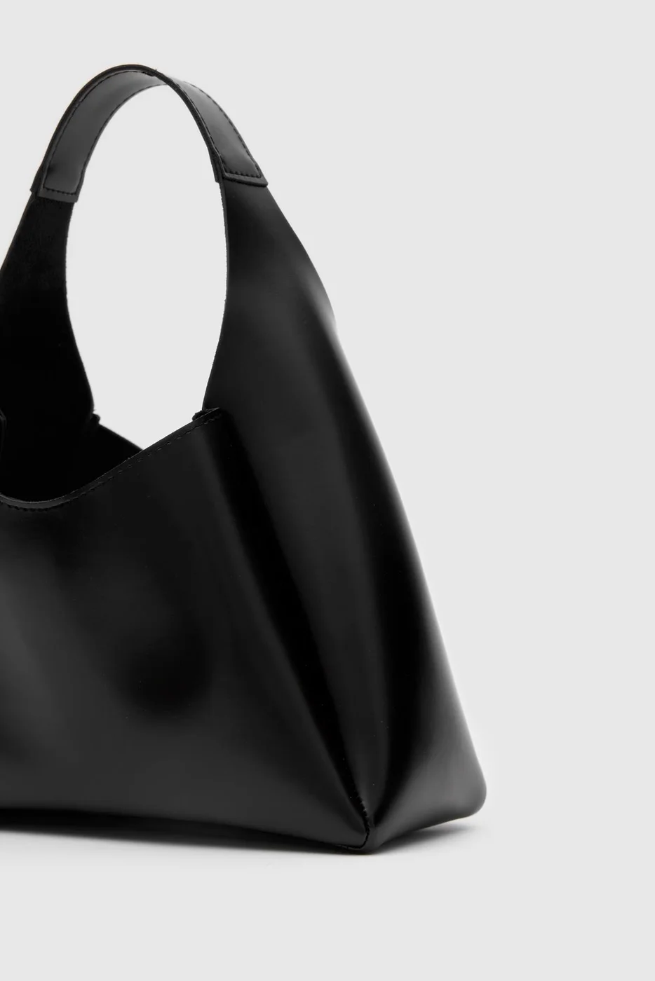 Faux leather shoulder bag in black