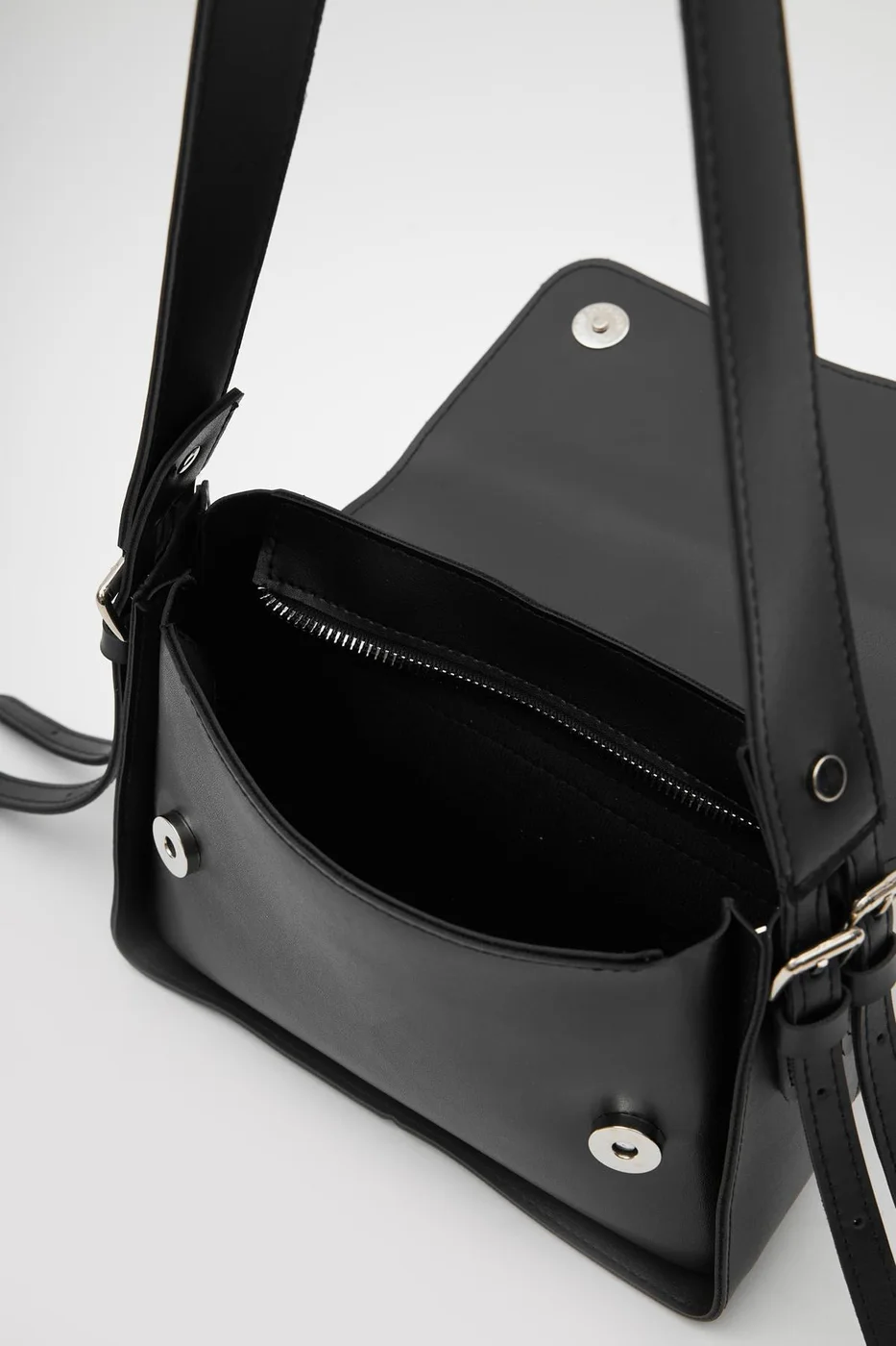 Faux leather crossbody bag in black