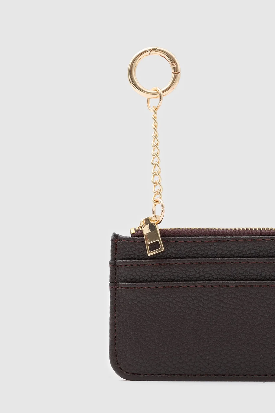 Faux leather card holder in dark brown