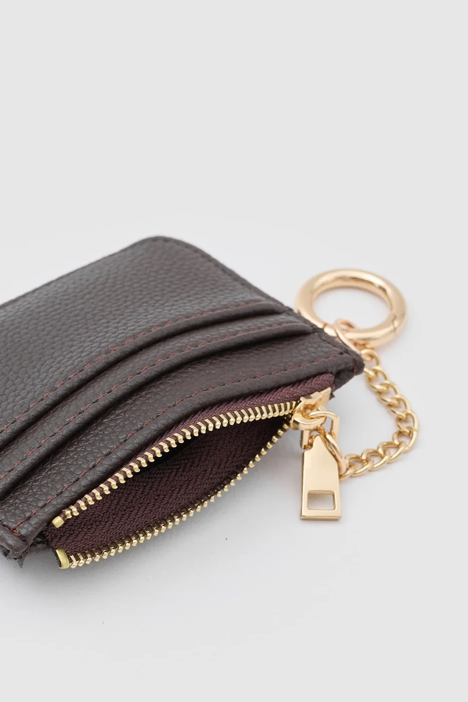 Faux leather card holder in dark brown