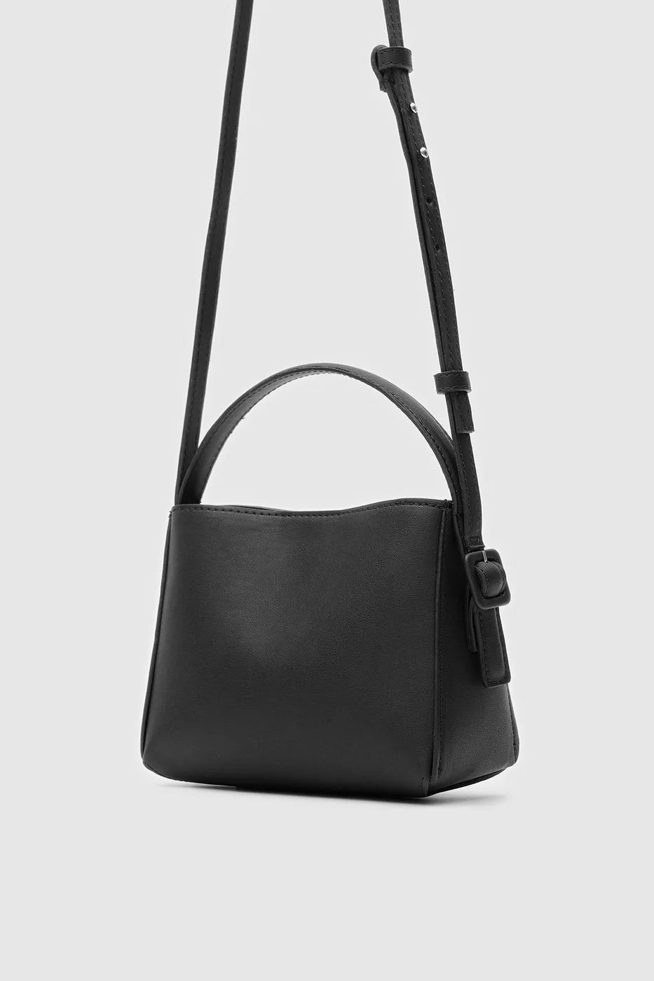 faux leather crossbody bag in black