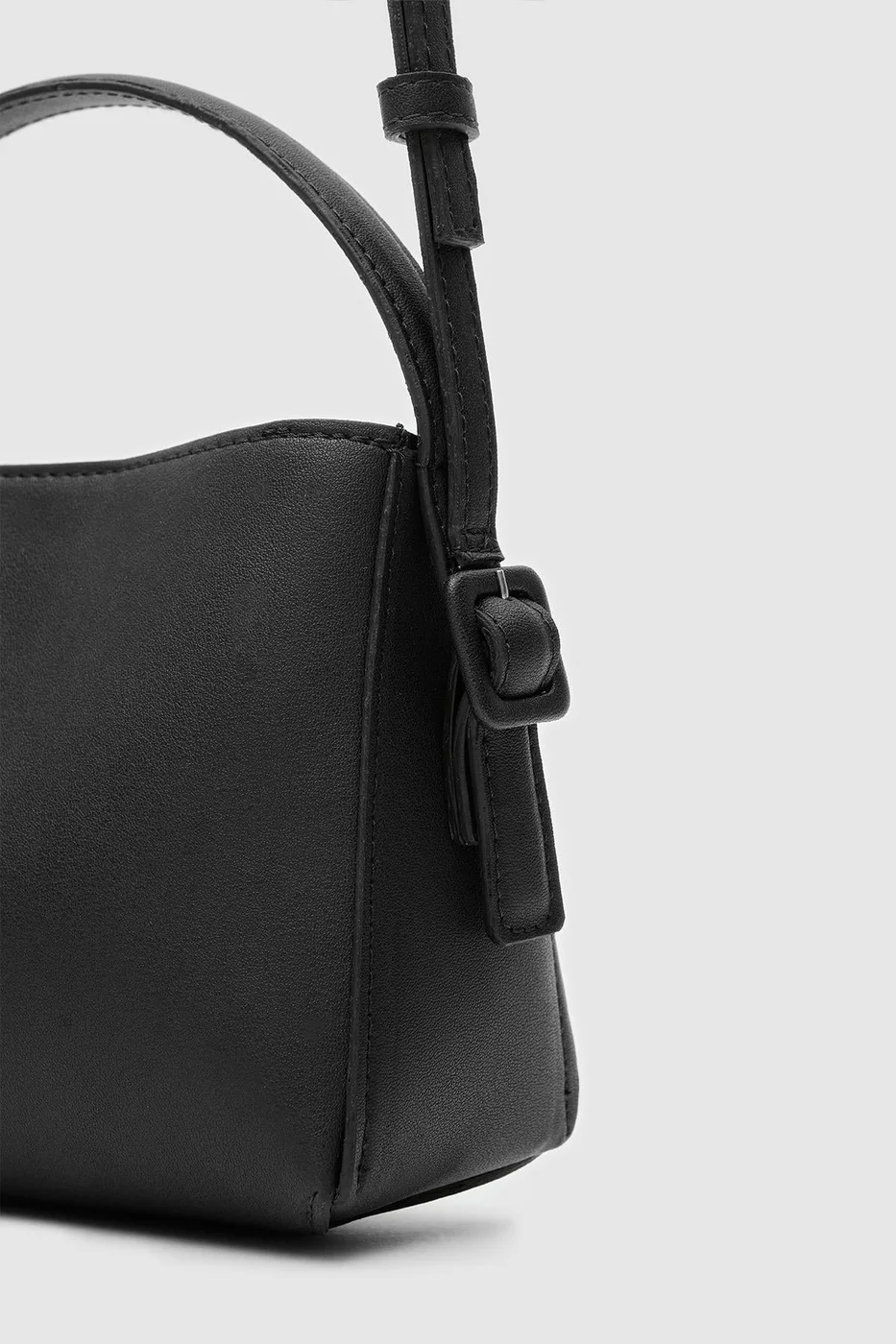 faux leather crossbody bag in black