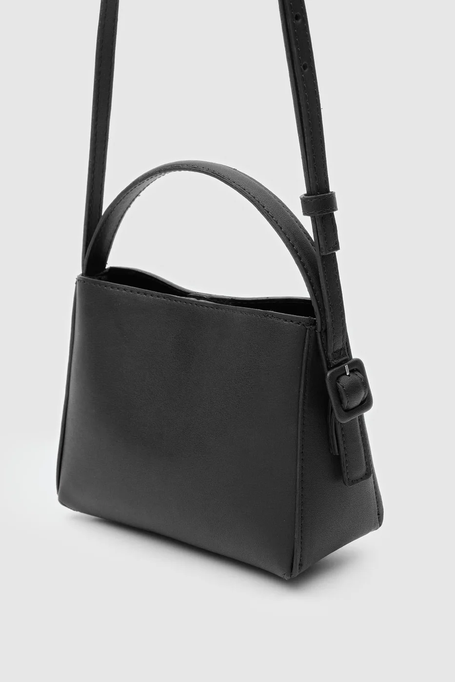 faux leather crossbody bag in black