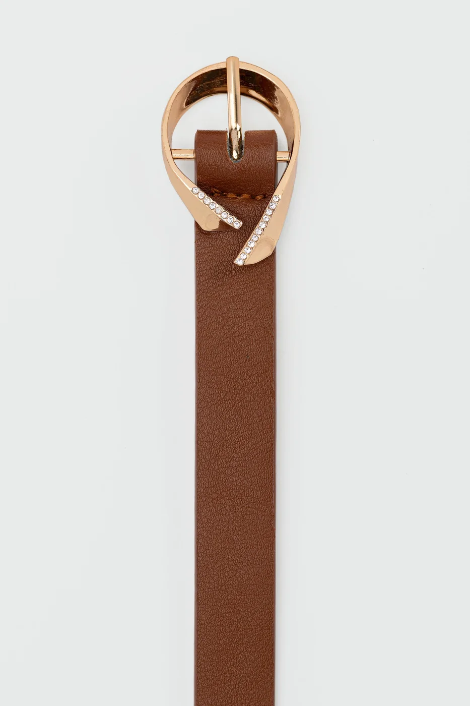 faux leather belt with oval buckle in tan