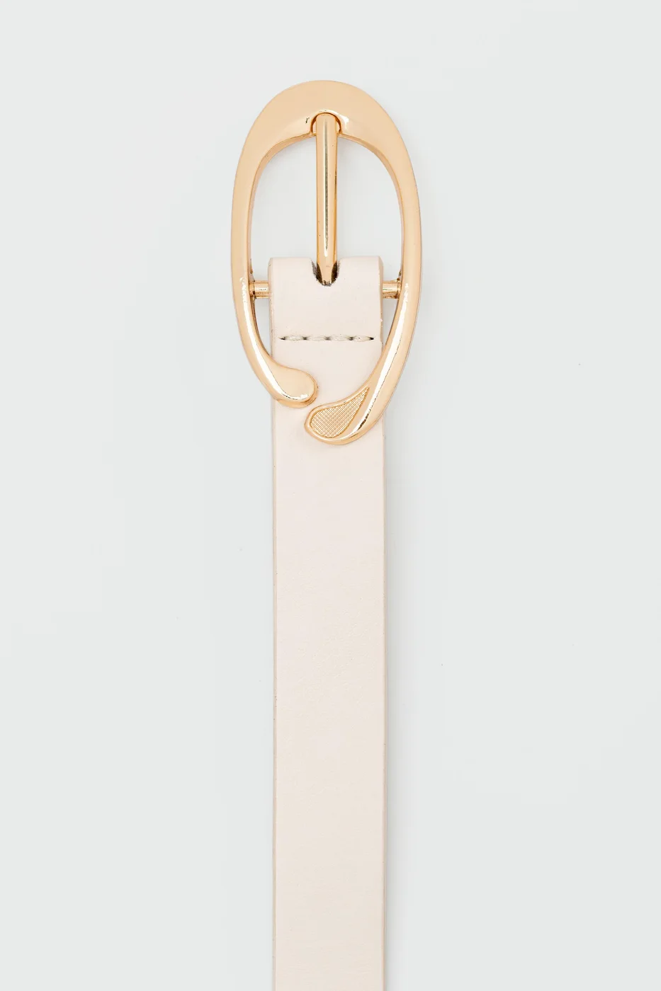 faux leather belt with oval buckle in cream