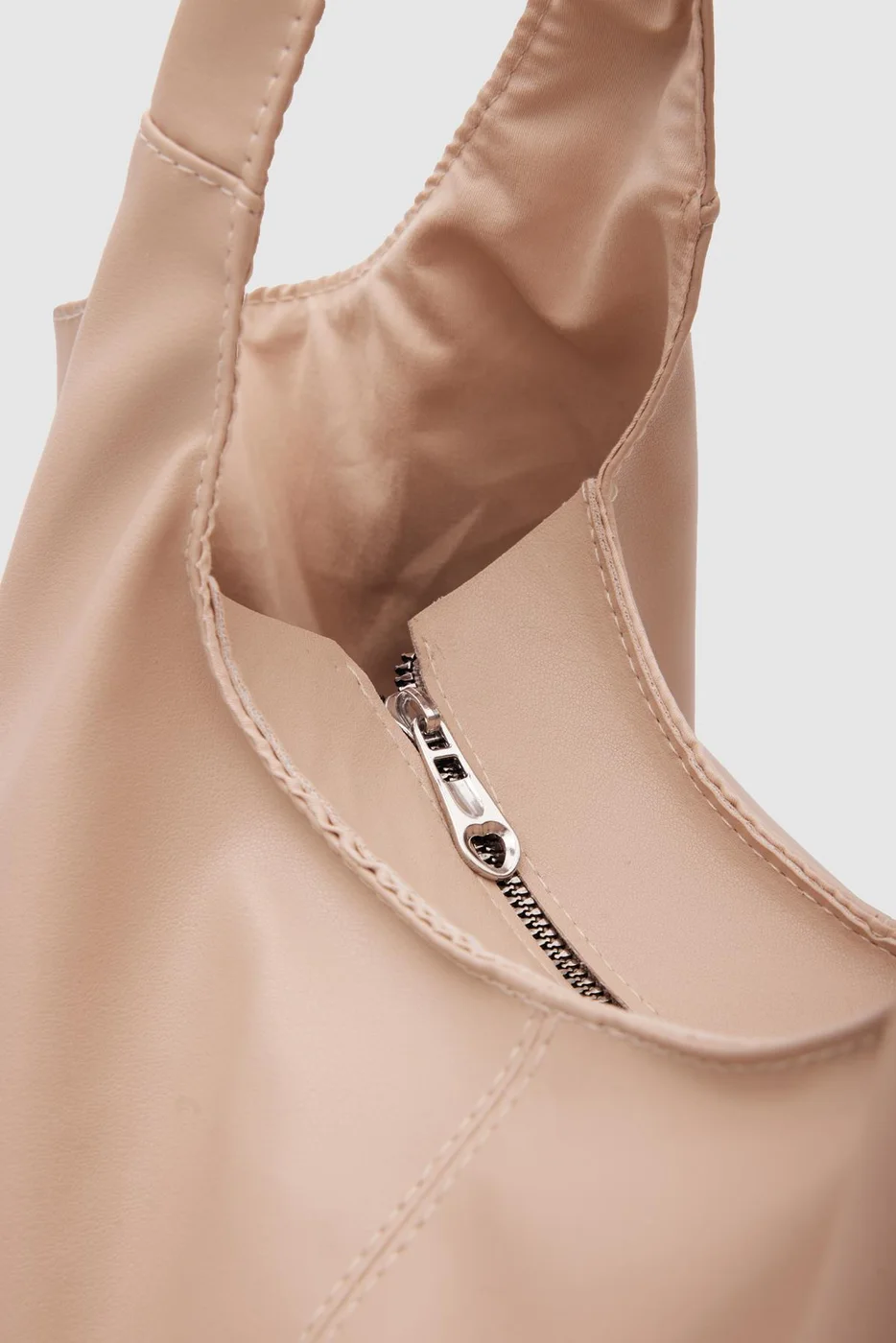 faux leather shoulder bag in beige