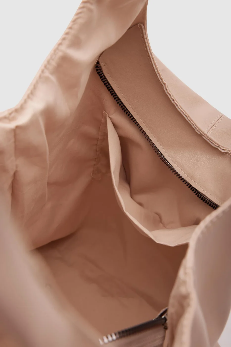faux leather shoulder bag in beige