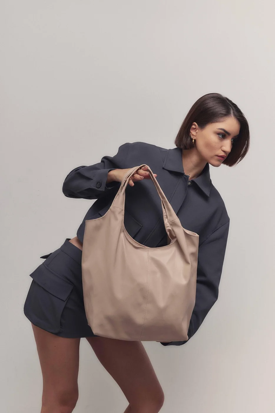 faux leather shoulder bag in beige