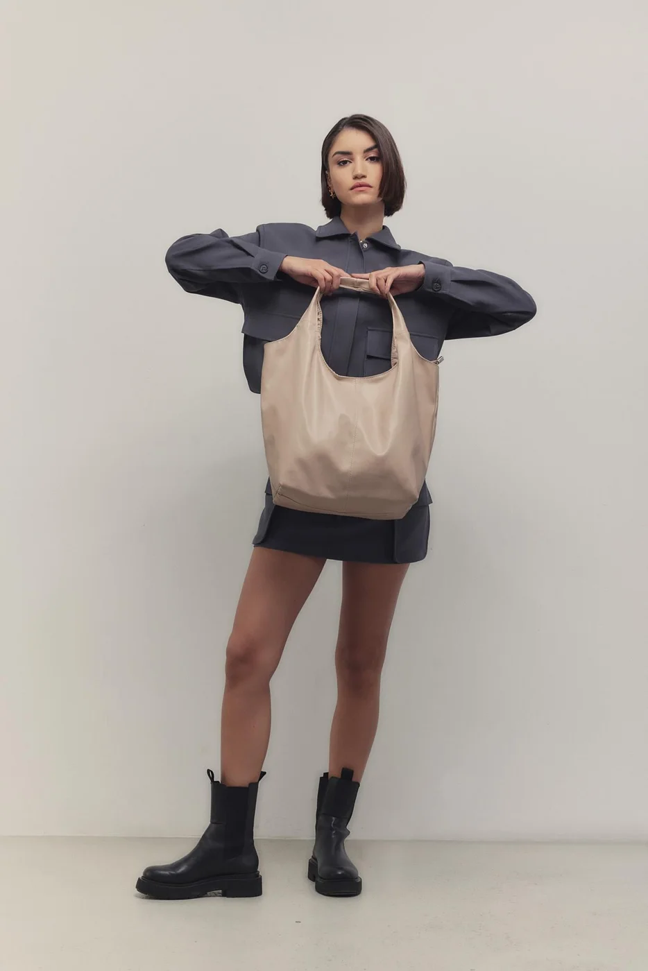 faux leather shoulder bag in beige