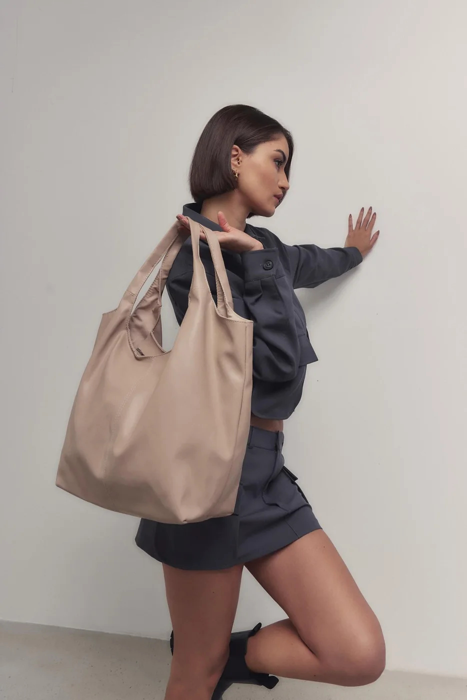 faux leather shoulder bag in beige