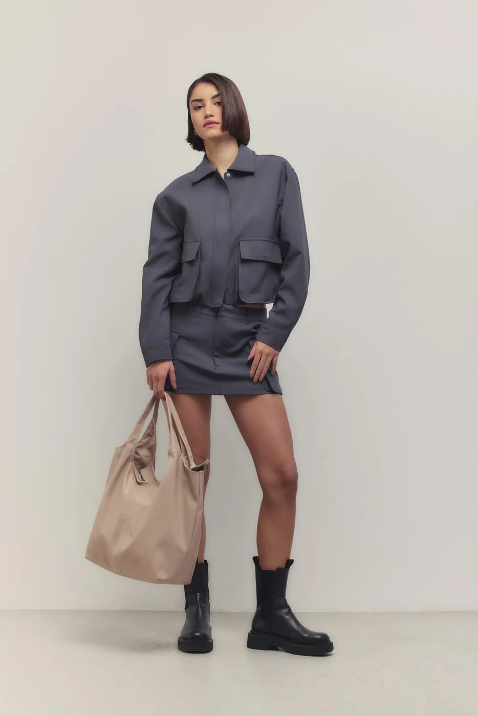 faux leather shoulder bag in beige