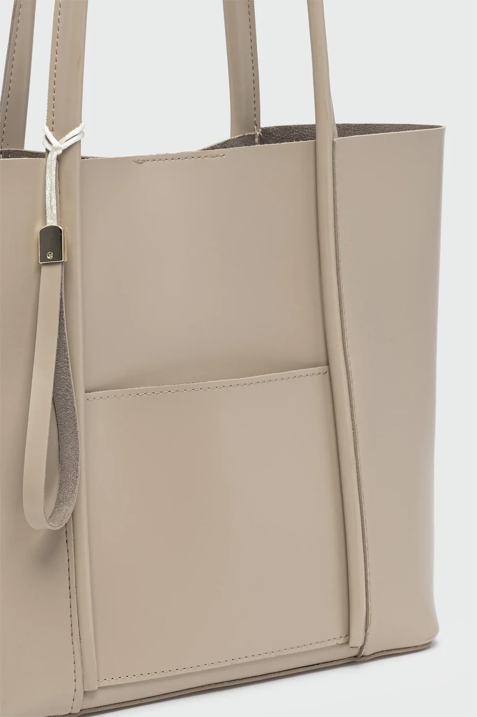 Faux leather shoulder bag in beige