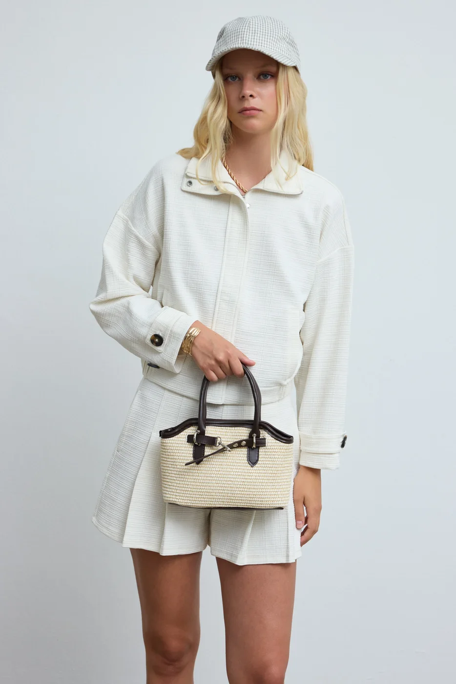 Woven crossbody bag in dark brown