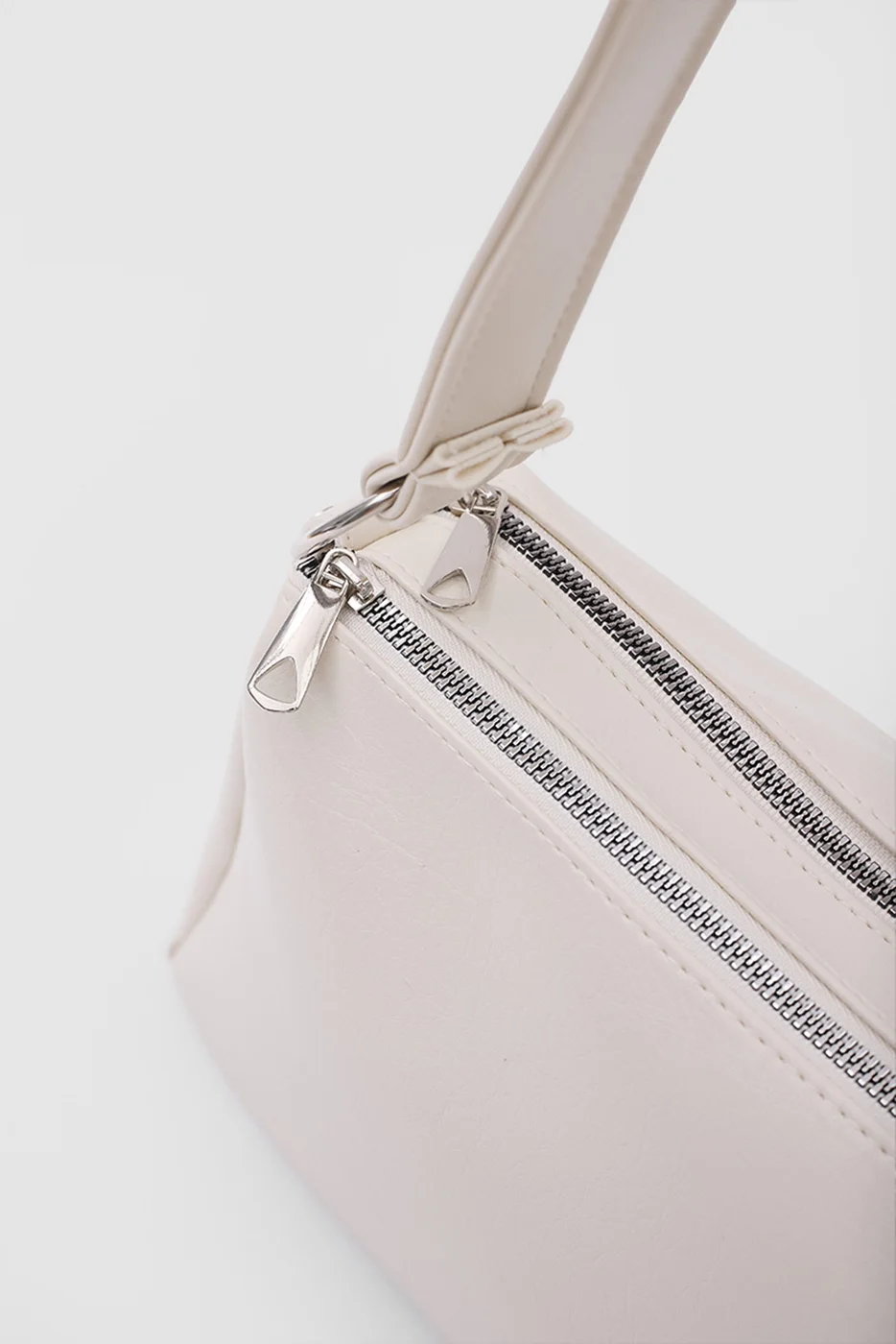 multi pocket shoulder bag in cream